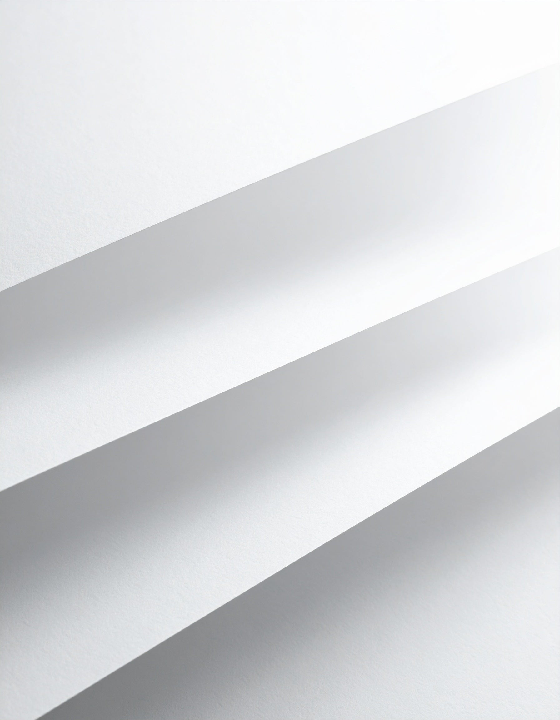 Design-Ästhetik: Detailaufnahme von weißem Papier – geschmacksRaum® WERBEAGENTUR – Ihr Partner für Social Media & Digital Content im Landkreis Mühldorf a. Inn